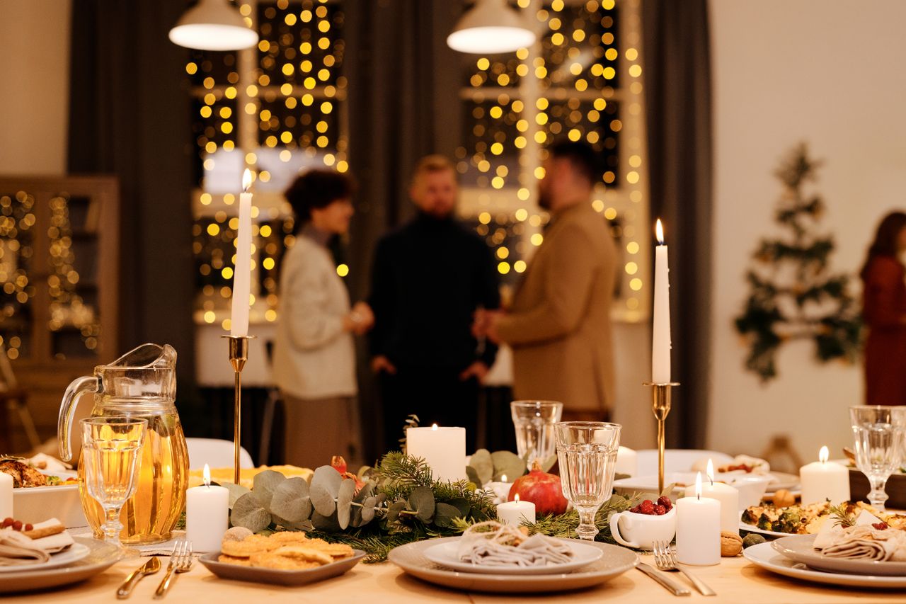 Dining table set with candles for a Christmas dinner