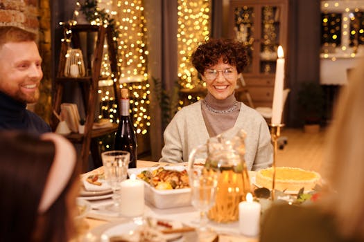 Warm and joyful Christmas dinner gathering indoors with friends and family.