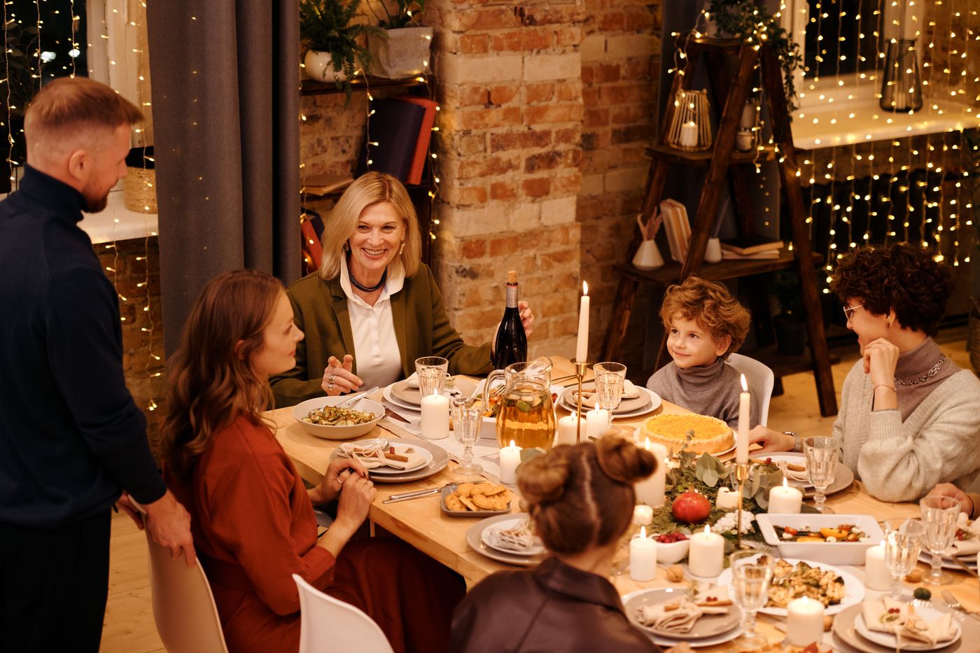 Beautiful holiday dinner table prepared for guests