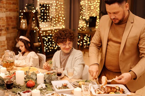Free Family Having a Christmas Dinner Together Stock Photo