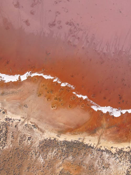 Foto profissional grátis de água, areia, corpo d'água