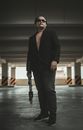 Man in Black Suit Jacket and Black Pants