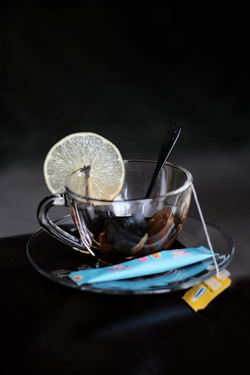 레몬 슬라이스, 설탕 가방, 수직 쐈어의 무료 스톡 사진
