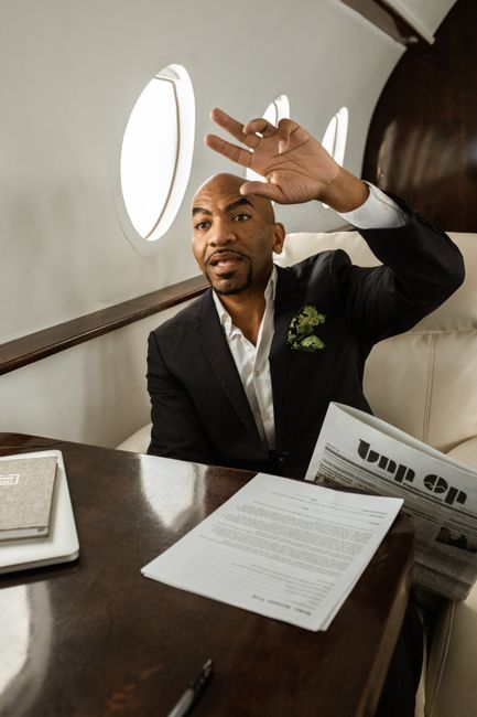 7 Modern Alternatives to Traditional Chauffeur Services 4 luxury car parked outside a modern office building, symbolizing peer-to-peer rental with driver