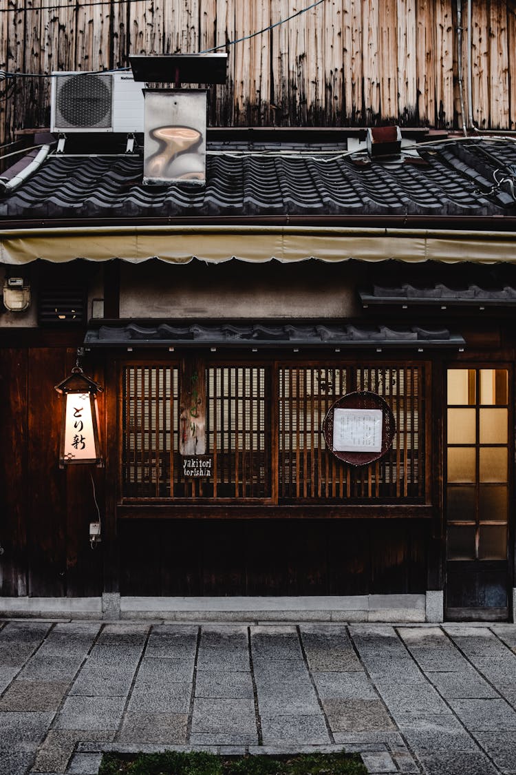 Brown Wooden Exterior Of An Asian Eatery 