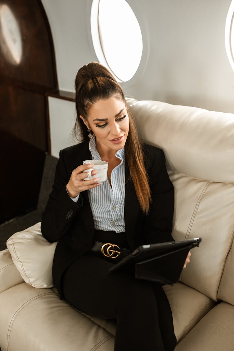 Business Woman Looking At An Ipad 