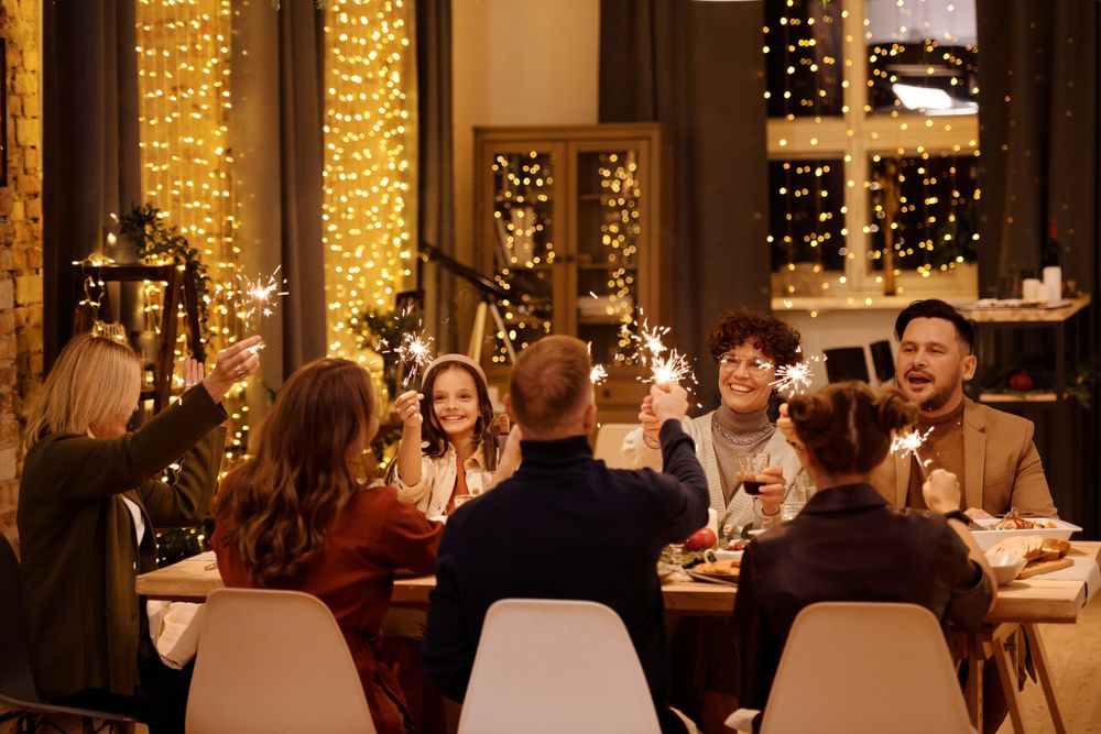 Residents sharing a festive dinner in the event lounge