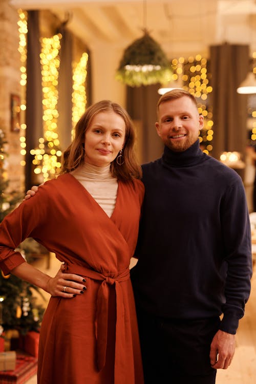 Couple Smiling While Looking at the Camera