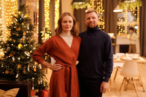 Couple Smiling While Looking at the Camera