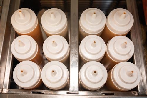 Close-Up Shot of Plastic Condiment Containers