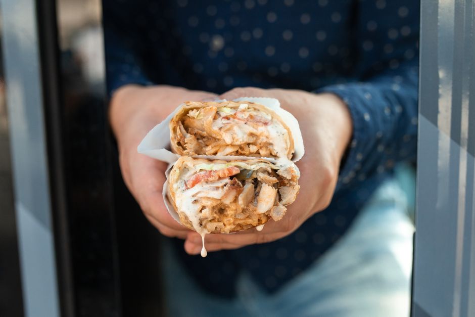 A street food stall in Oman preparing shawarma
