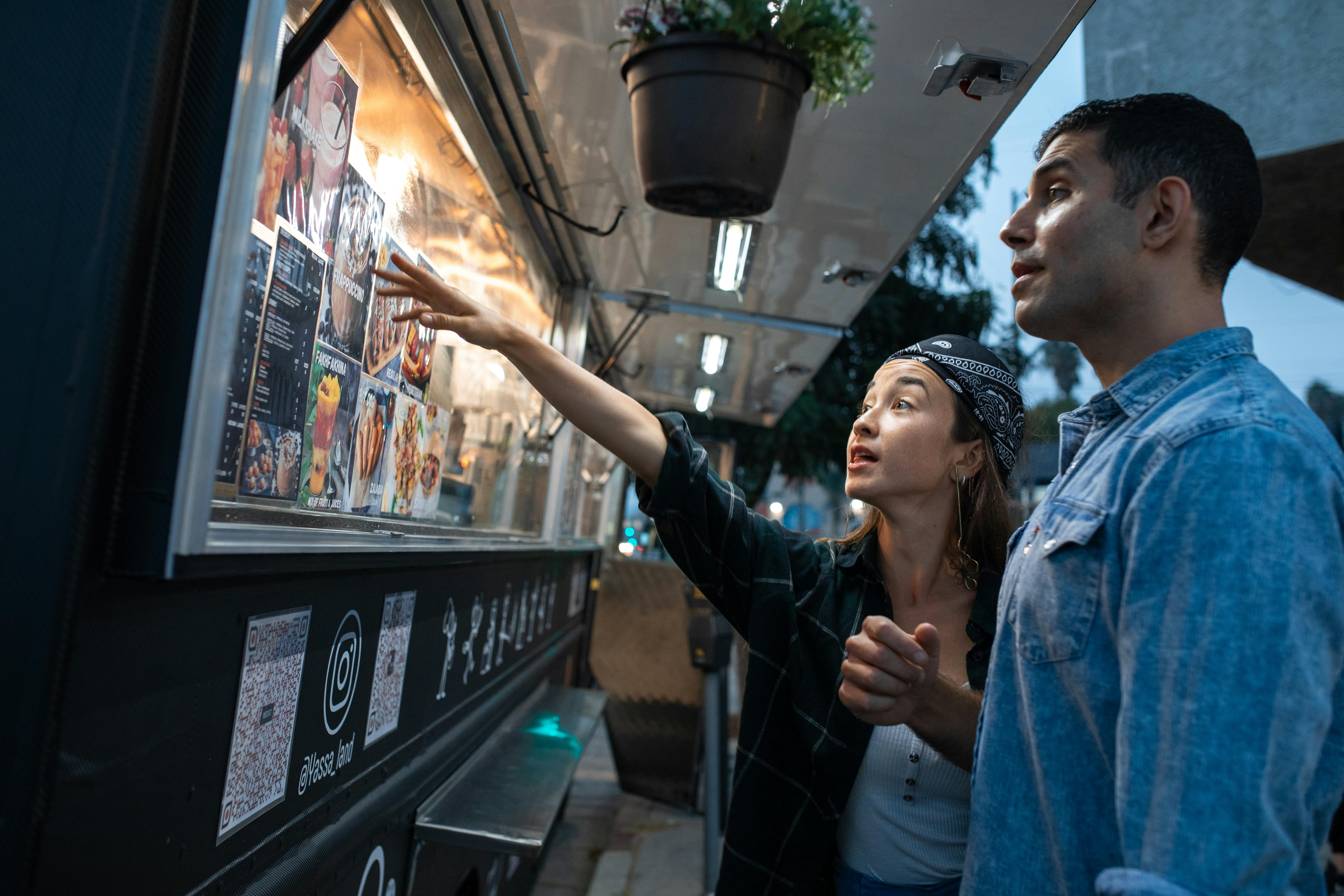 couple ordering food from a food truck