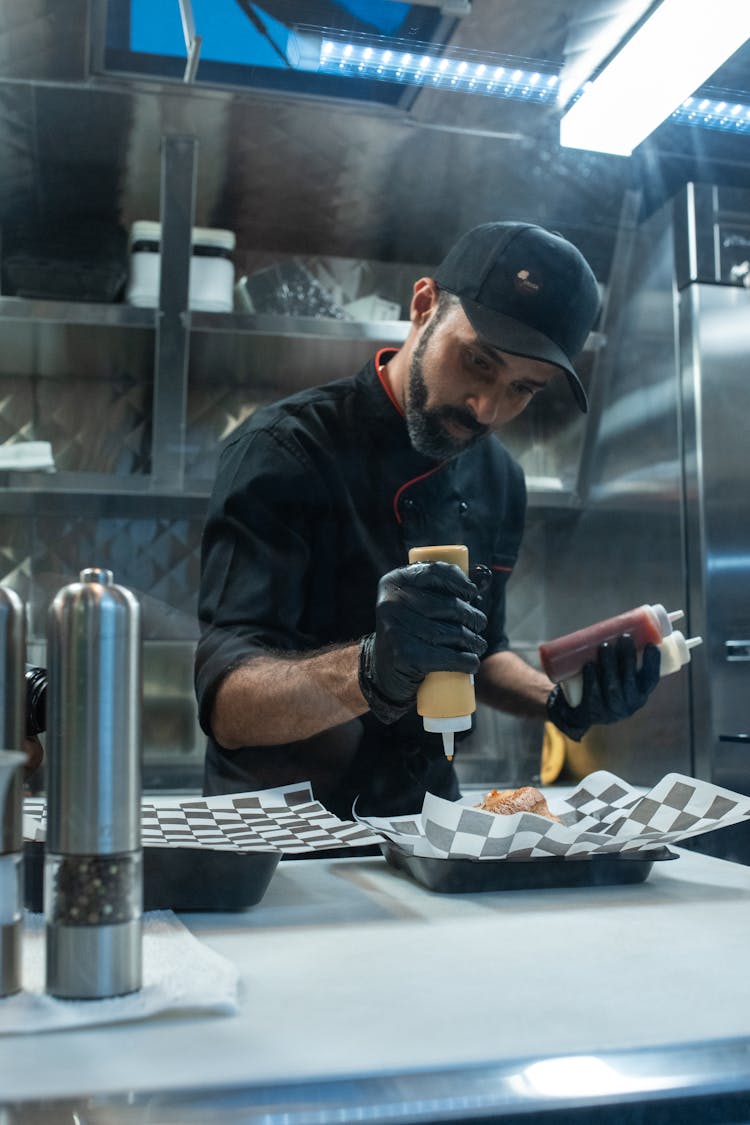 A Man Preparing A Food