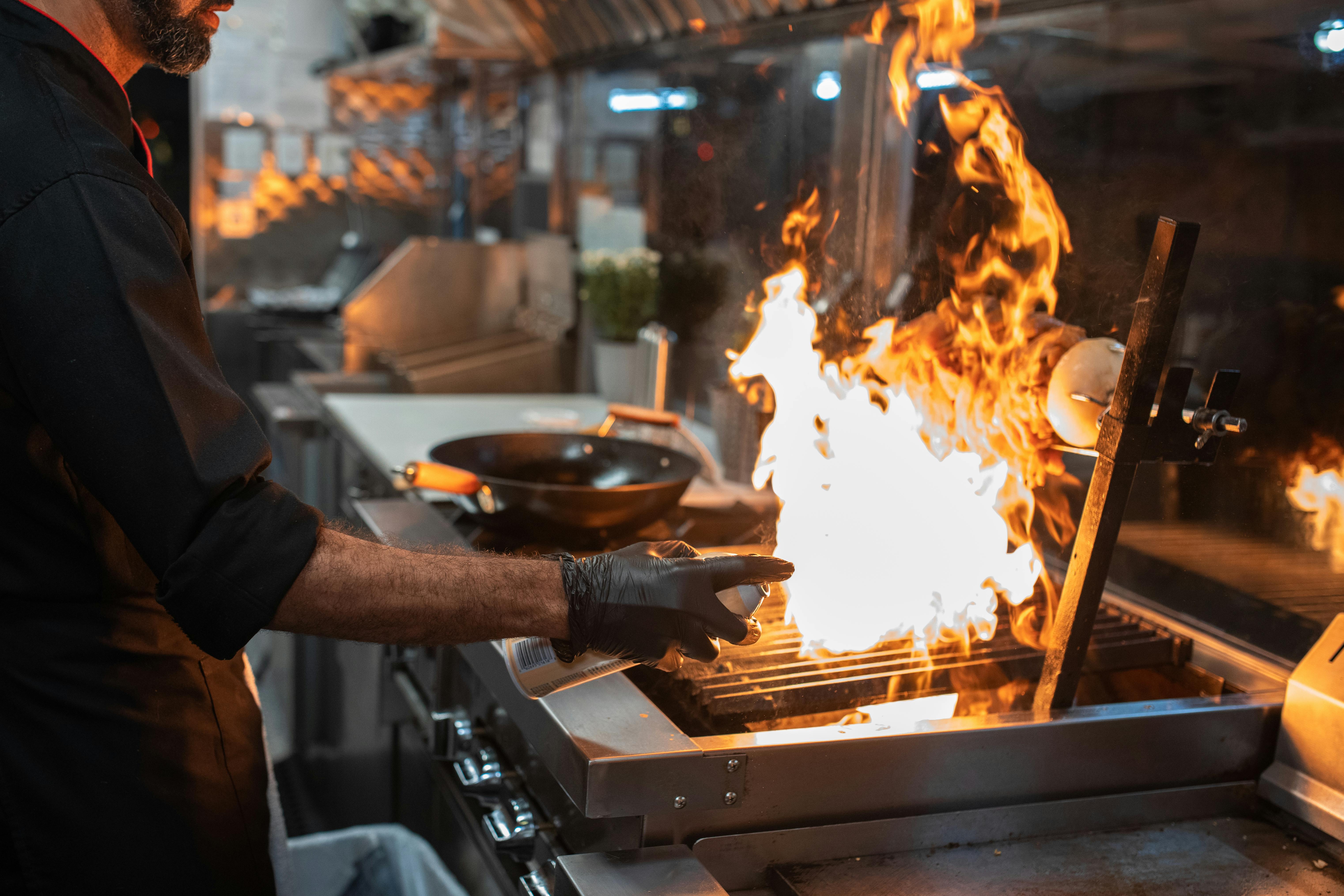 a man cooking kebab