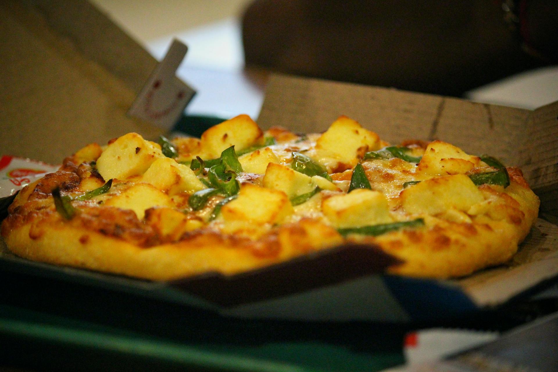Cheesed Pizza on Box