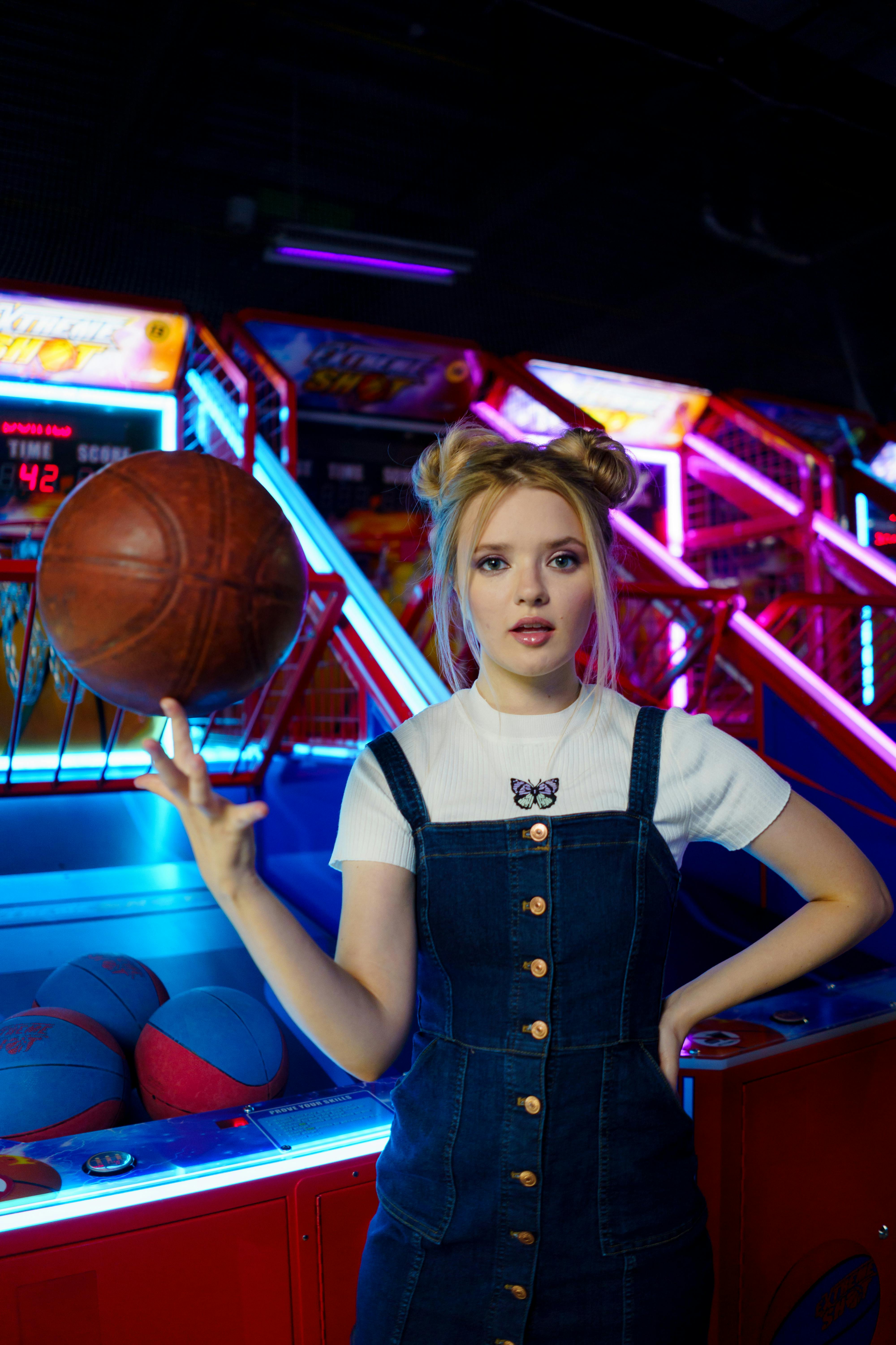 girl holding a basketball