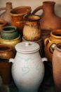 White Ceramic Jar on Brown Wooden Table