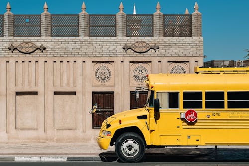 okul otobüsü, otobüs, park etmiş içeren Ücretsiz stok fotoğraf