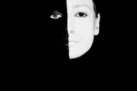 Mysterious woman with greasepaint on face