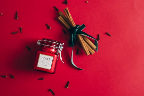 Candle on a Red Jar