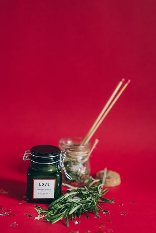 Scented Candle on a Green Glass Jar