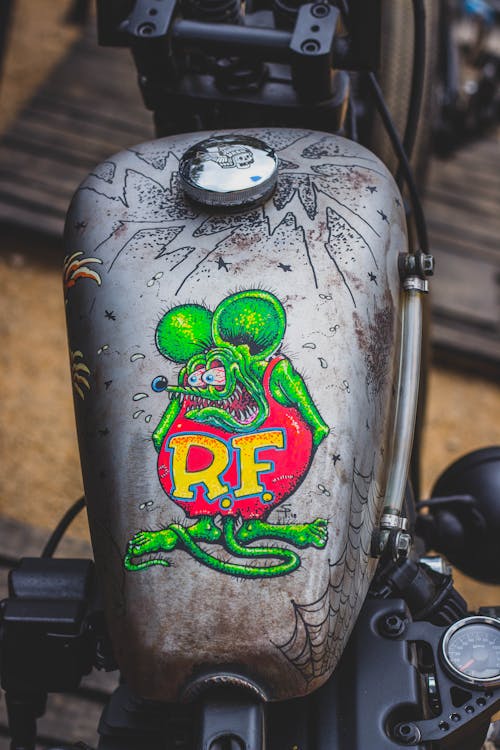 Free Gray and Green Motorcycle in Close Up Shot Stock Photo