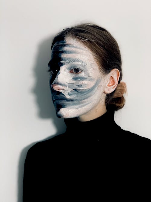 Free Spooky woman with painted face Stock Photo