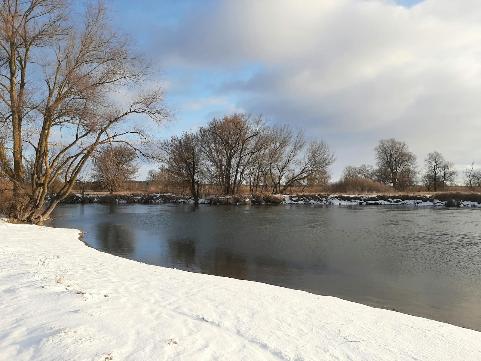 Close-up of a hockey player’s skates and stick during a game on the ice