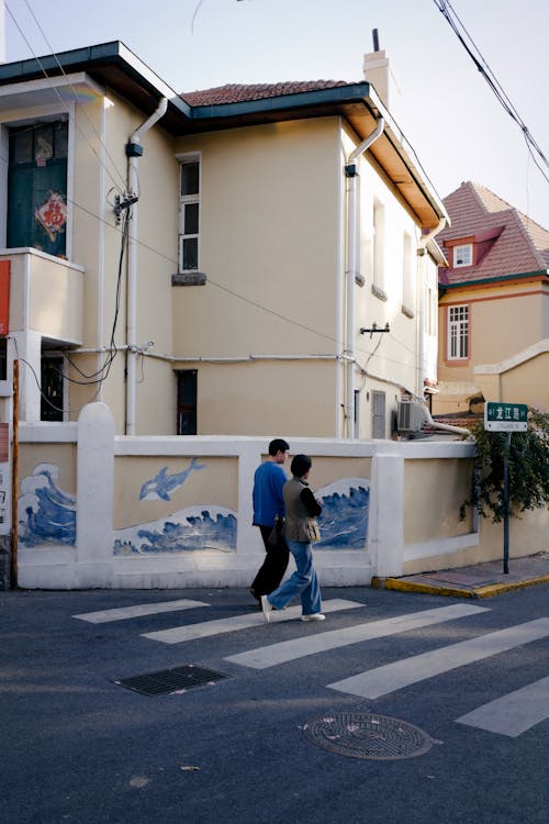 People Walking on Sidewalk