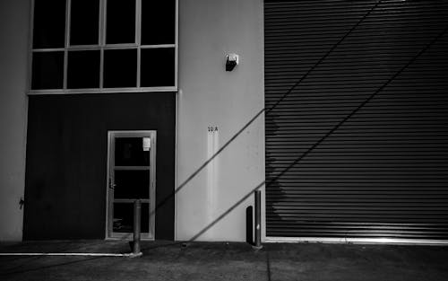 Black and White Photo of a Closed Garage Door