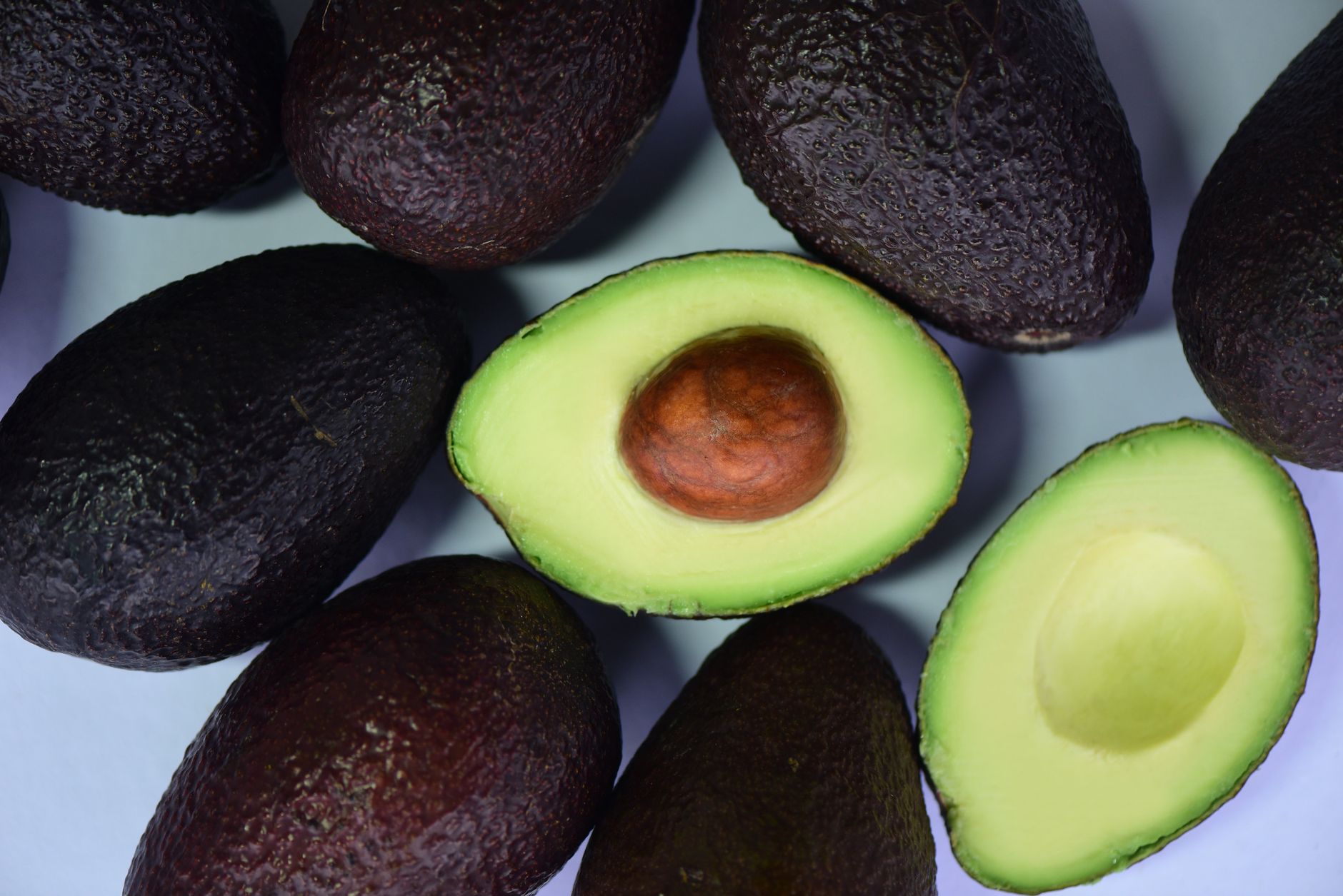 Fresh and frozen avocado chunks side by side