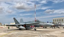 Gray Fighter Jet on Gray Concrete Ground