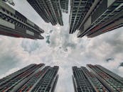 Contemporary city skyscrapers against majestic sky