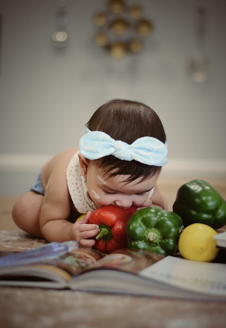 Baby Eating Bell Pepper