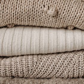Stacked undyed ribbed cotton knits — Pavel Danilyuk on Pexels