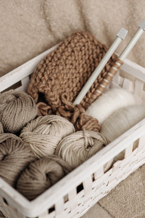 Free White and Brown Yarns In Basket Stock Photo