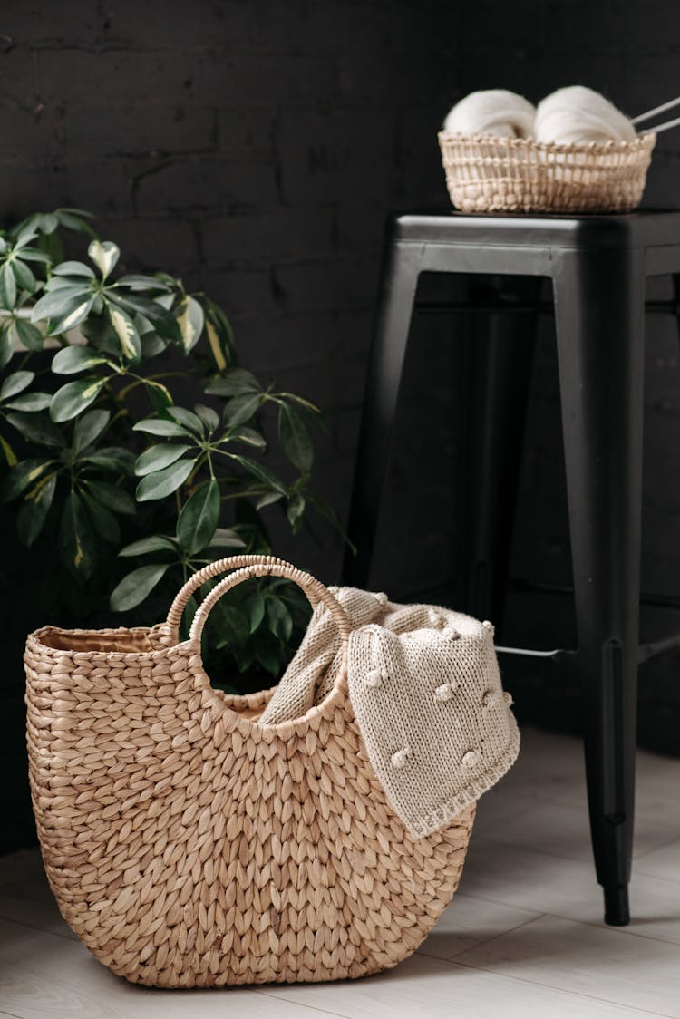 Knitted Sweater Inside A Woven Basket