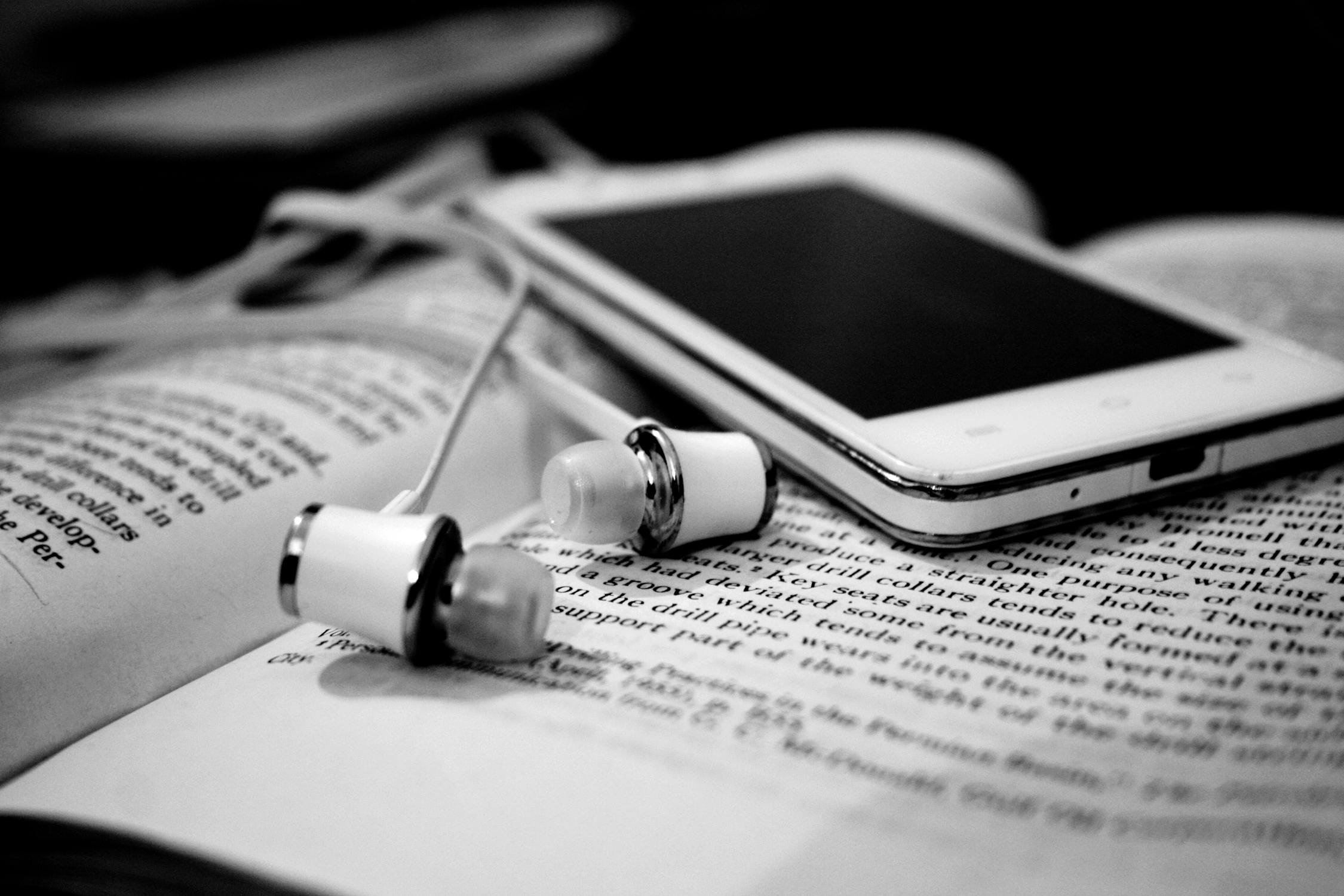 free-stock-photo-of-black-and-white-books-earphones