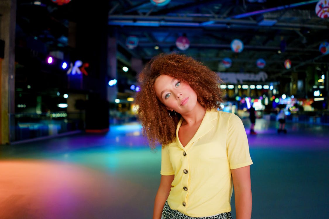 Beautiful Woman Wearing a Yellow Top