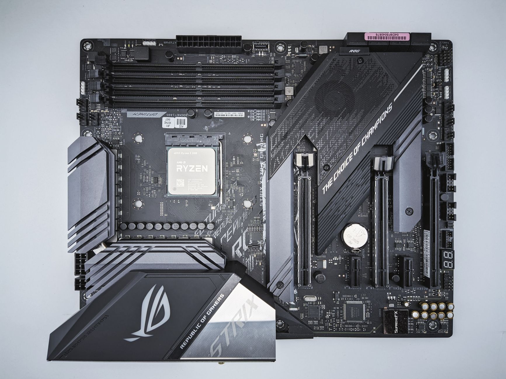 Detailed close-up of a gaming motherboard featuring advanced chip technology.