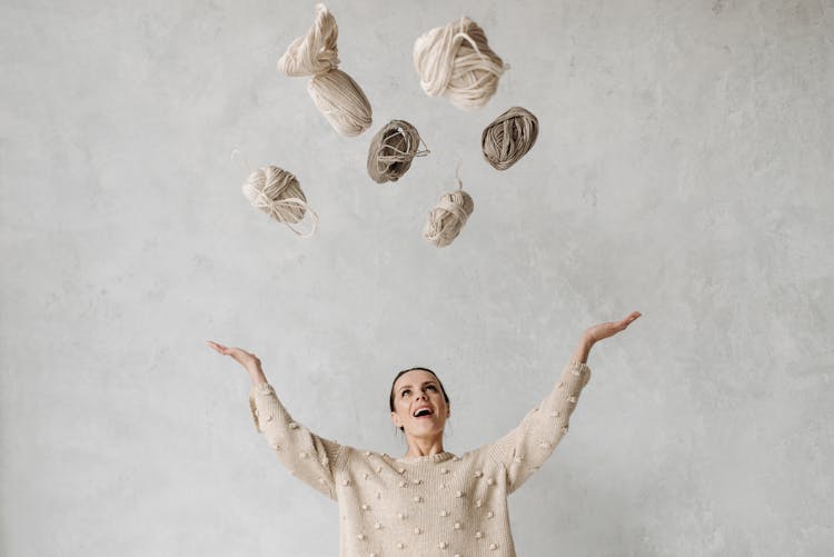 Woman Throwing Yarns