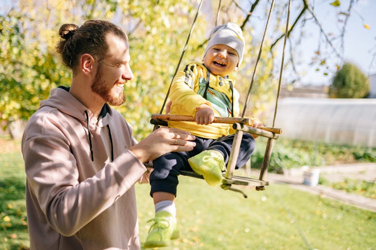 Toddler On A Swing