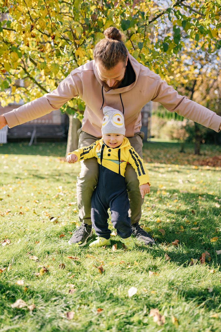 Father With His Son Playing Together