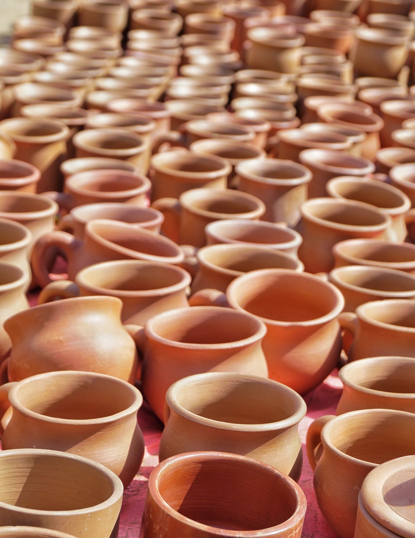 Elena working at the pottery wheel in her studio