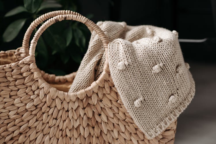 Knitted Sweater Inside A Woven Bag