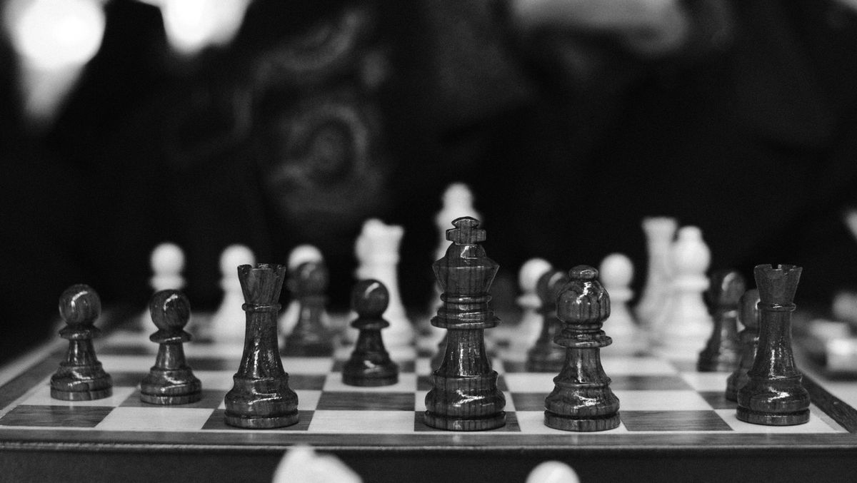 Dramatic chess pieces on a board