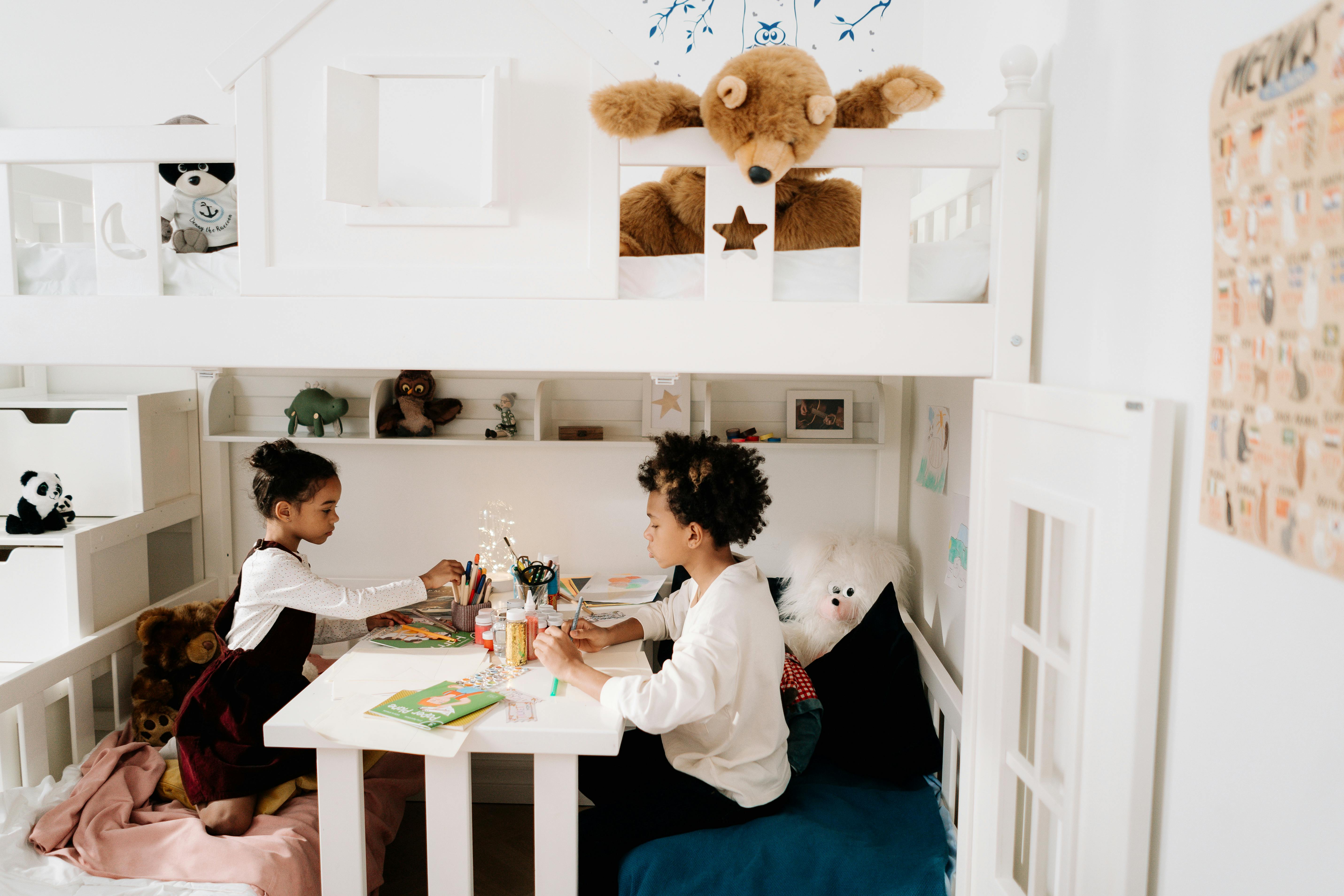 kids doing artwork on the table