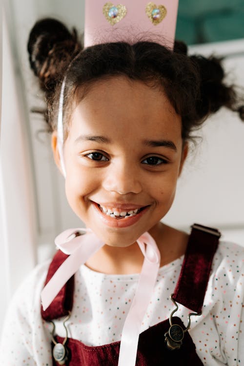 Free Girl Wearing a Paper Crown Stock Photo