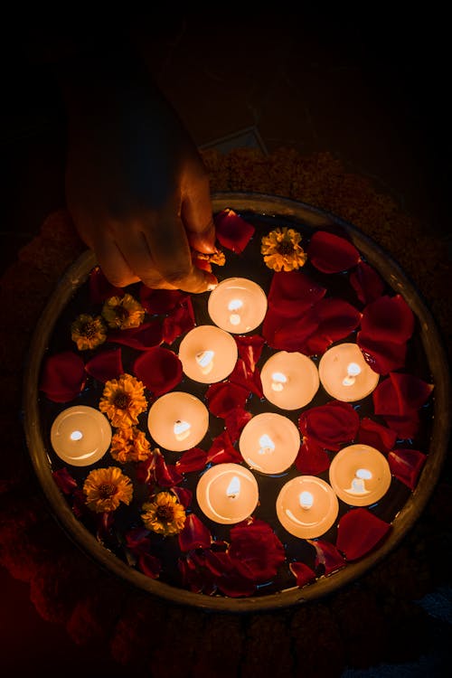 White Candles Floating on Water