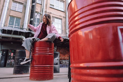 Carefree woman spending leisure in urban street